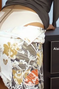 a wonderful ash-blonde chick with huge boobs is playing the tights